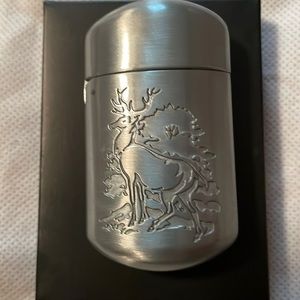 Cigarette extinguisher. With moose/ deer design. New in box